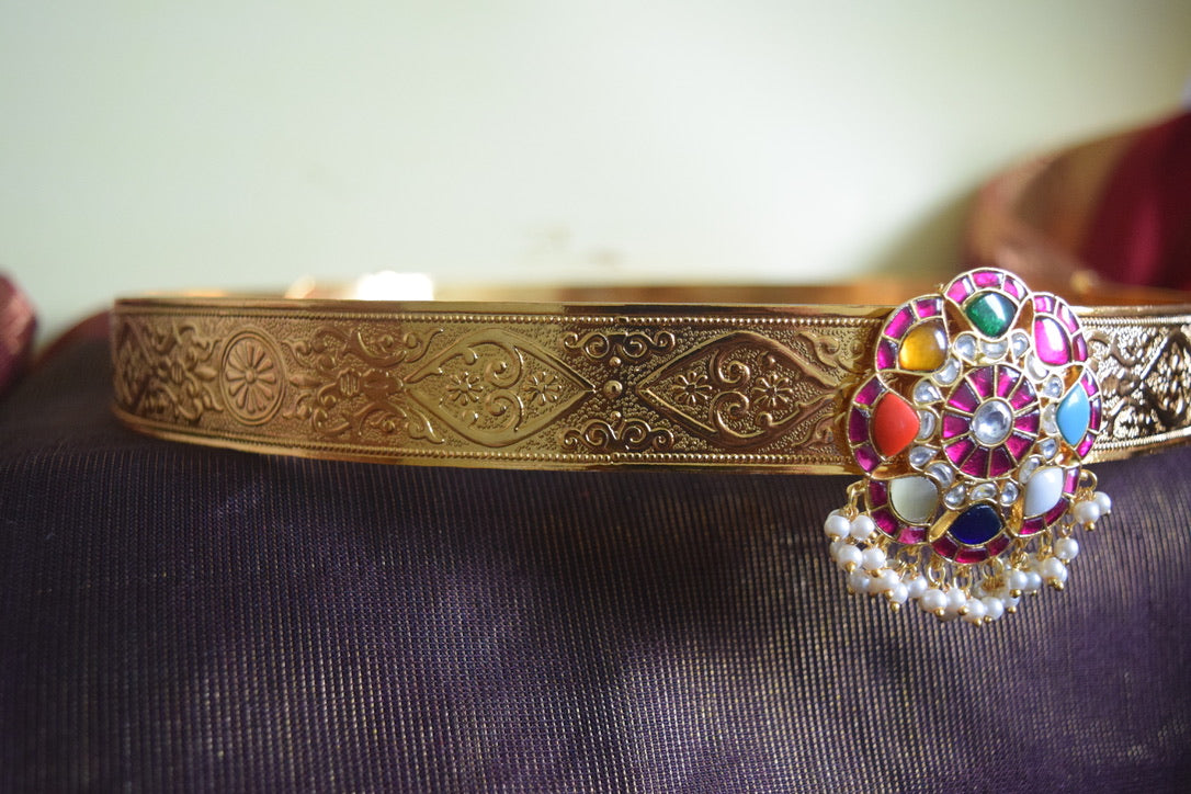 Flowered carving belt with pendant navaratna and pearl hanging