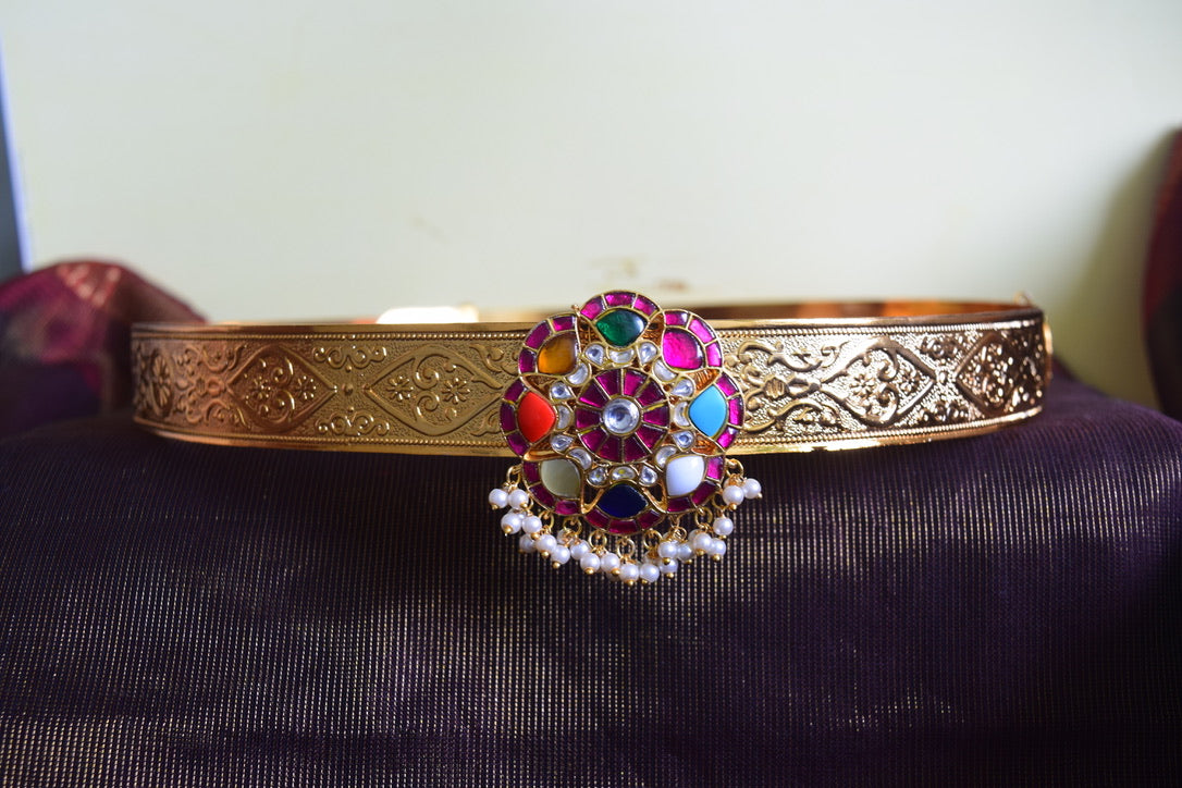 Flowered carving belt with pendant navaratna and pearl hanging