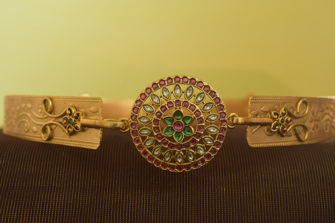 Gold finish flowered carving belt with pendant
