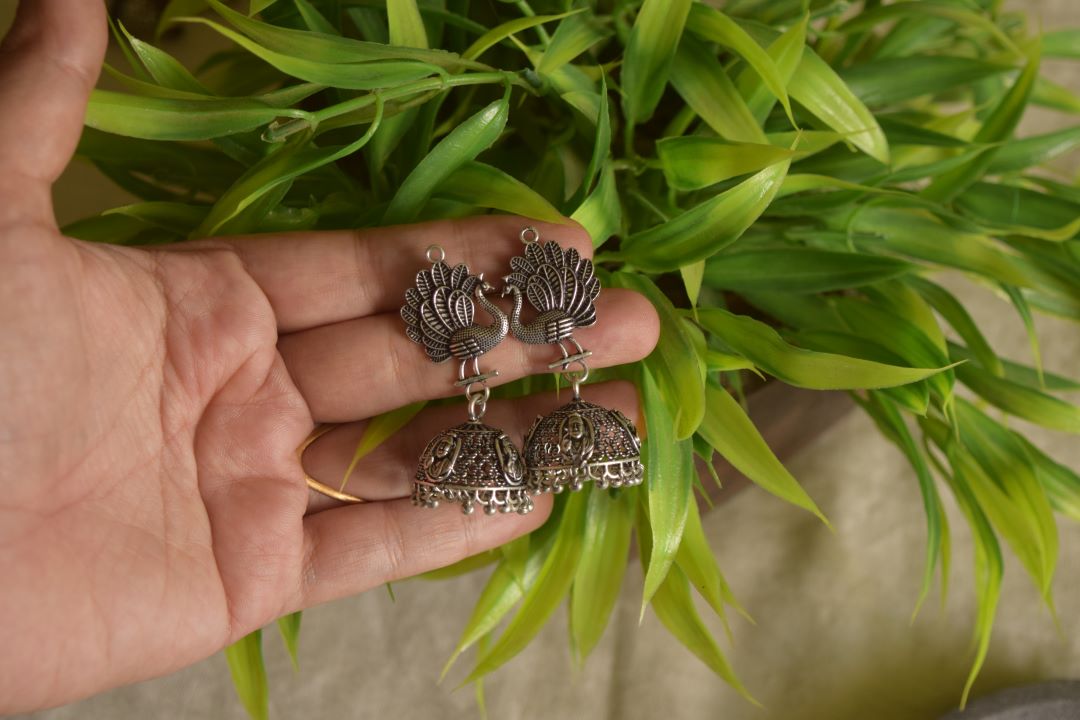 Silver Finish Peacock Stud with Sai baba carving jhumka