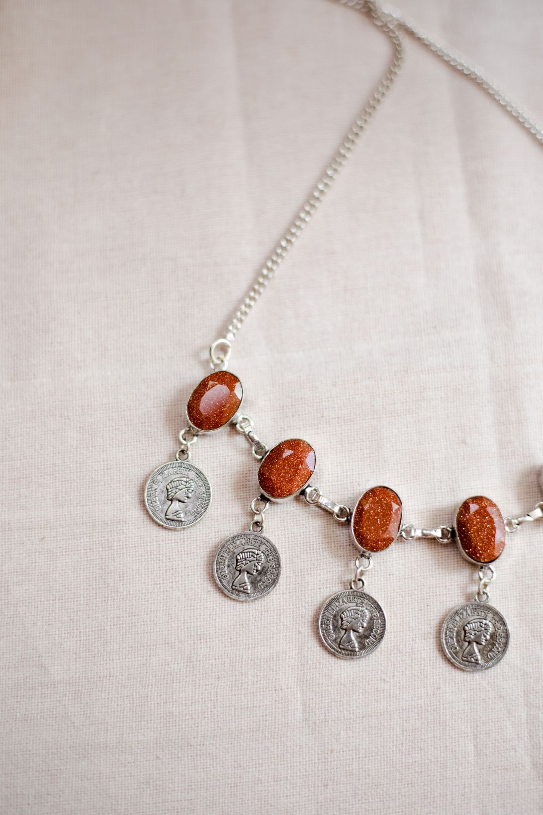 Silver Finish Oval Stone with Queen Elizabeth Dollar -30E
