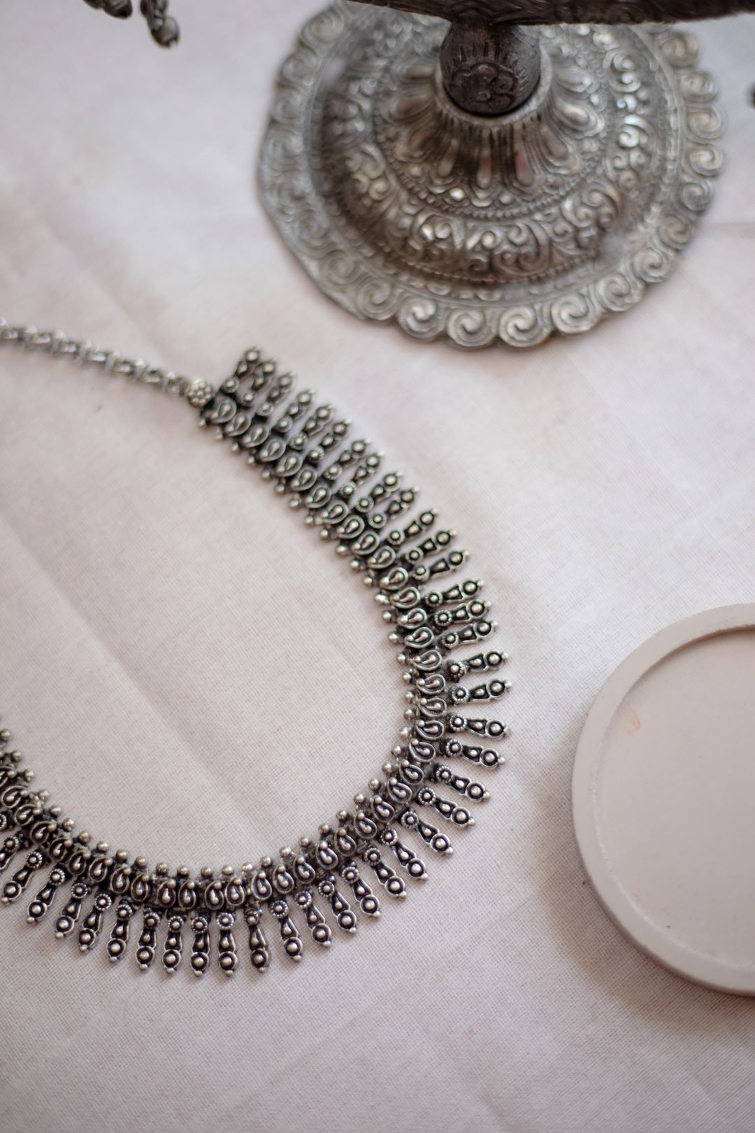Silver Finish tiny mango motifs with spikes droplets - Mini Kolhapuri Necklace