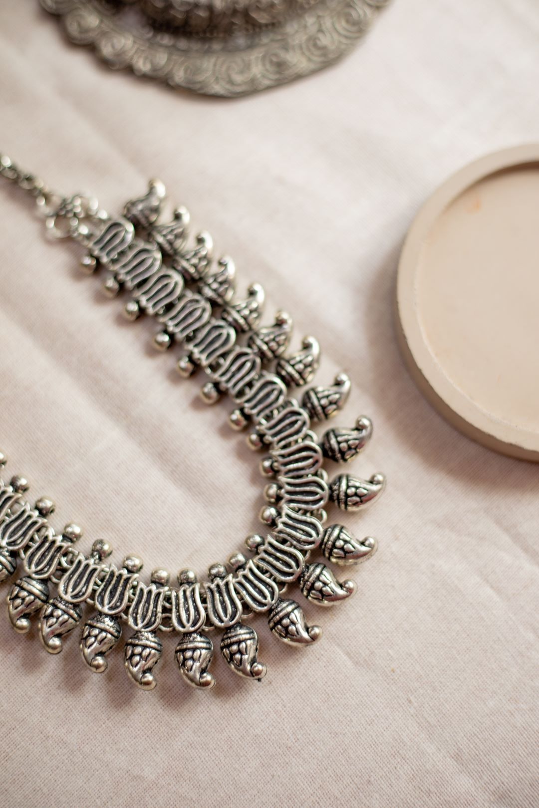Silver Finish lotus & mango motifs with Mango droplets - Kolhapuri Necklace