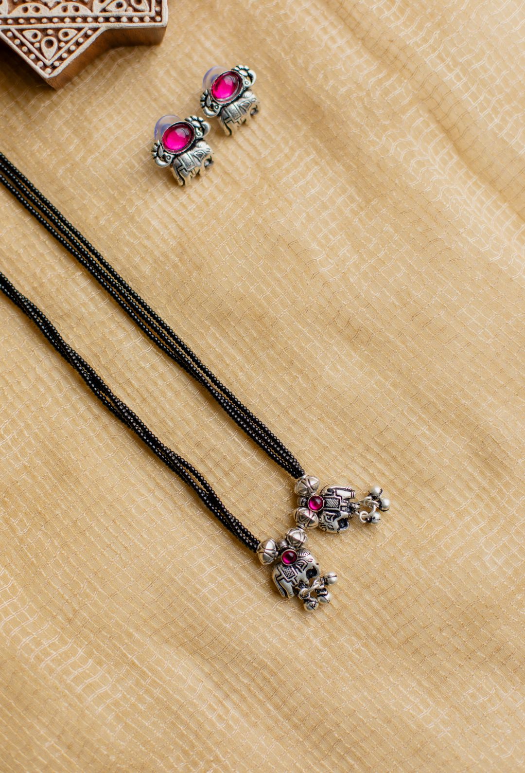 3 layered Black beads with elephant pendant
