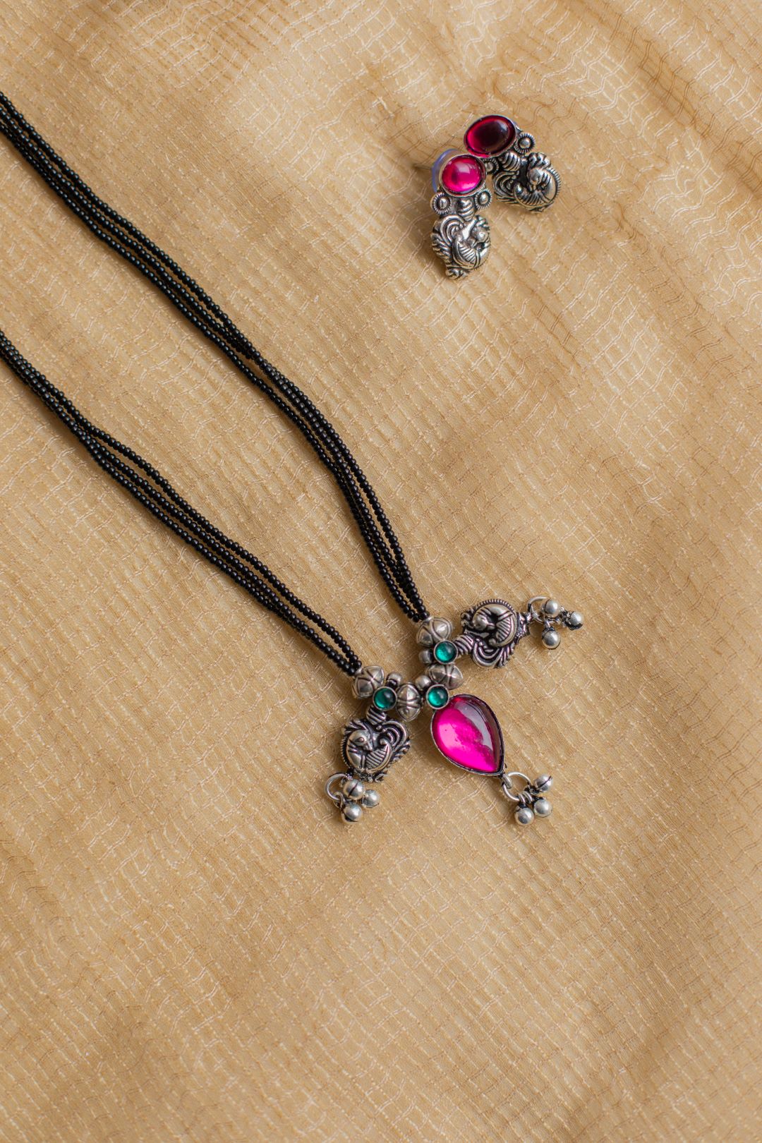 3 layered Black beads with peacock & rain drop pendant