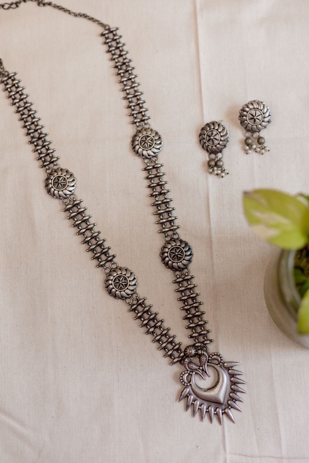 Silver Finish long HAARAM chakram parrot spikes pendant