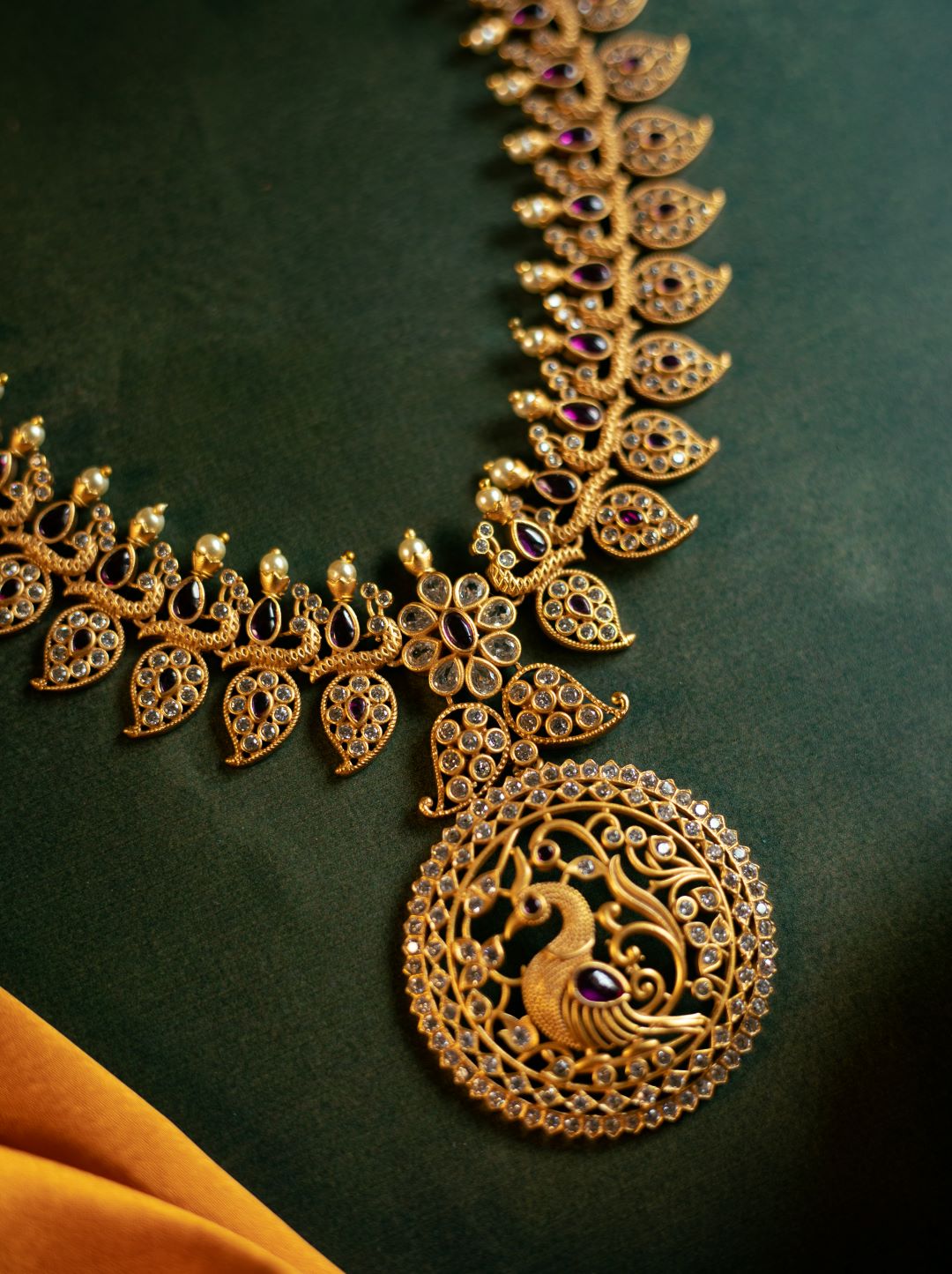 Gold Finish Mango Peacock AD -Ruby Necklace with Stud