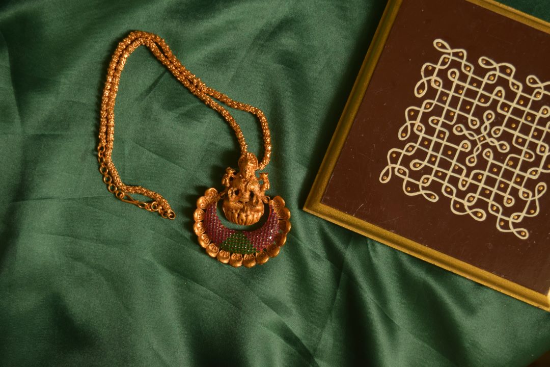 Matte finish long chain with lakshmi carving pendant with stone