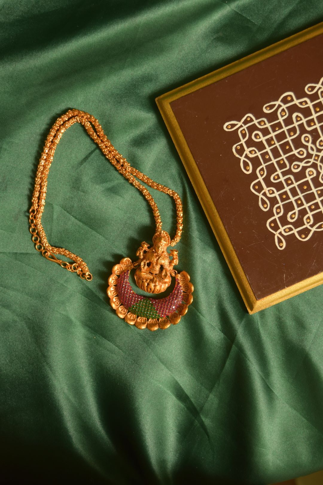 Matte finish long chain with lakshmi carving pendant with stone