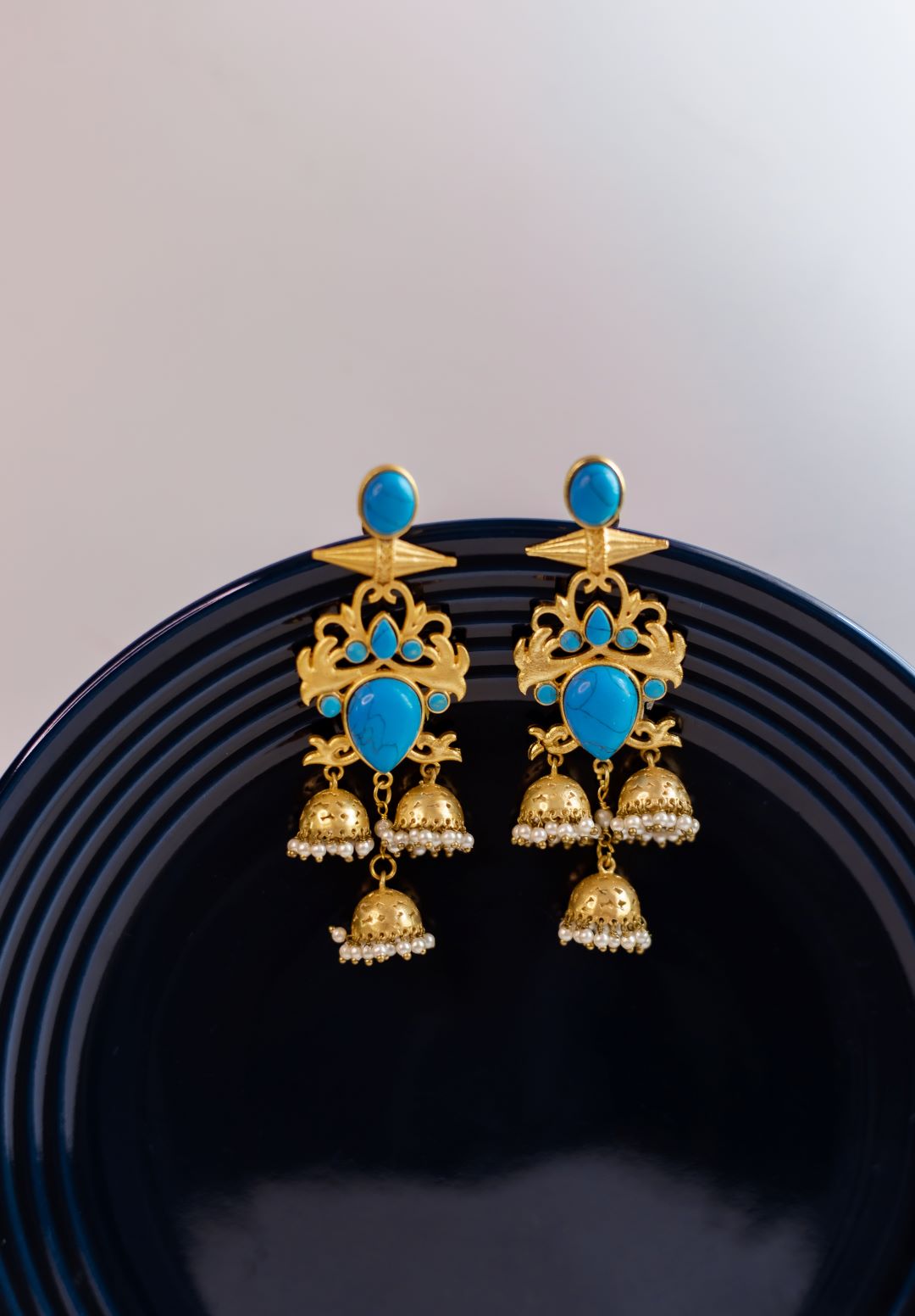 Gold Finish statement Sky Blue Bullet Stud Chandlier Jhumkas