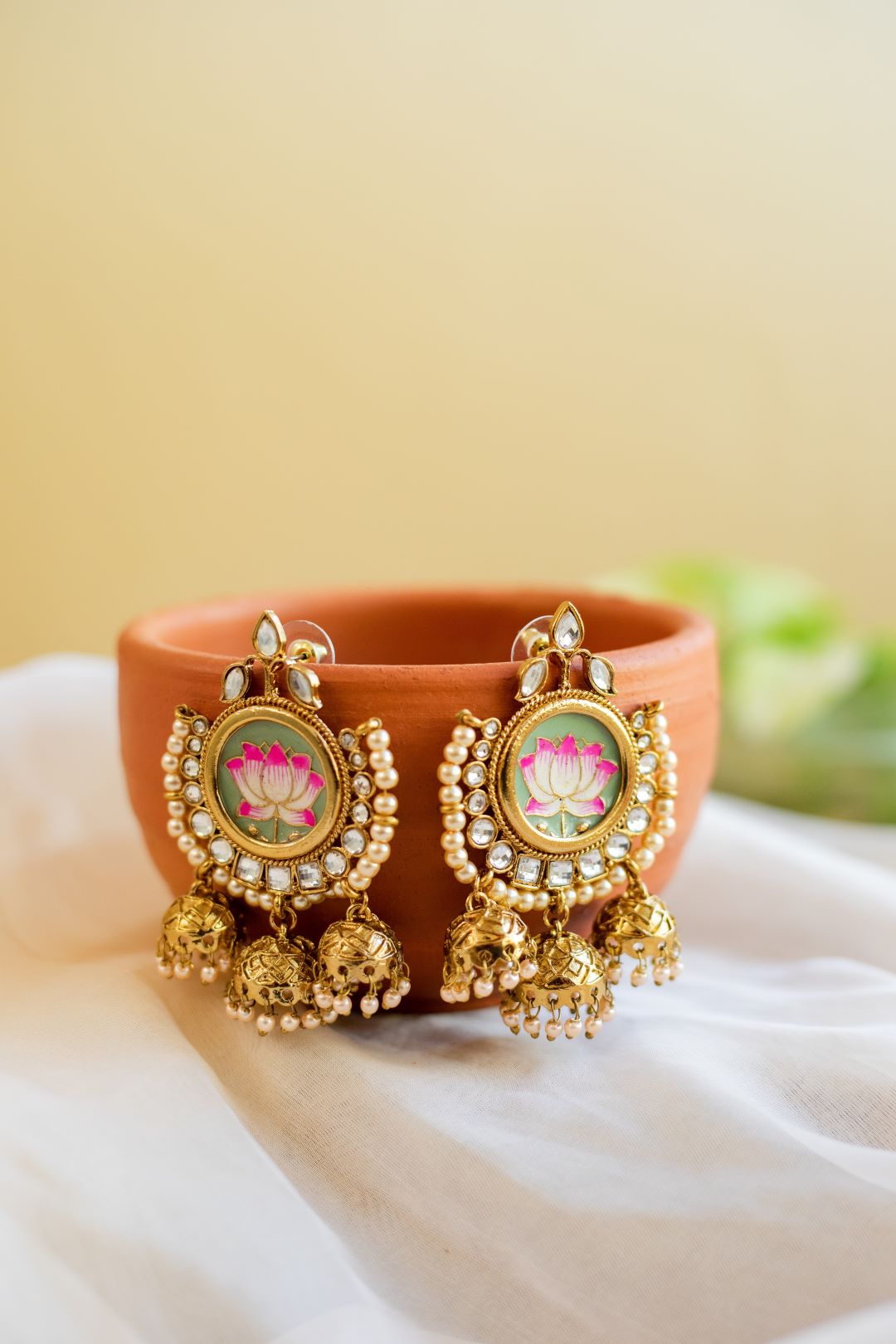 Gold Finish pastel green lotus enamel with kundan & pearl stud with chandlier jhumka