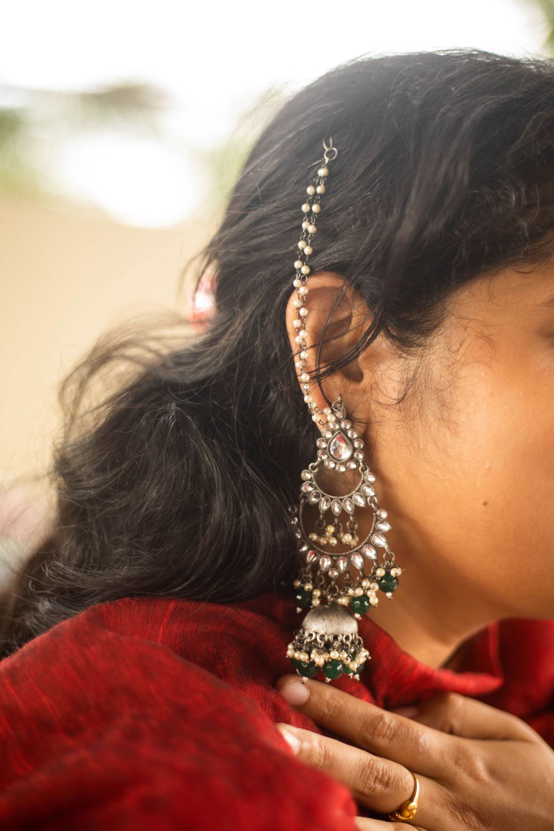 German Silver finish tear drop kundan layered stud jhumkas with maatal & Green Beads