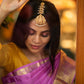 Gold Finish Nagasu Tikka mango motifs model with Lakshmi Carving Nagasu -Ruby