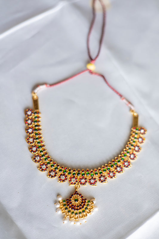 Imitation Kemp -Gold Finish  mango motifs chakram  pendant  with pearl hangings #36