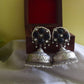 Silver Look Alike Statement Flower Jhumka - Black 15A