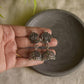 Silver Finish Peacock Stud with Sai baba  carving  jhumka