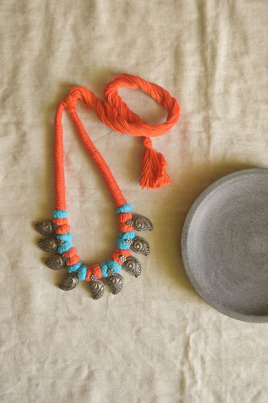 orange  and light blue thread  , Mango sequence motifs