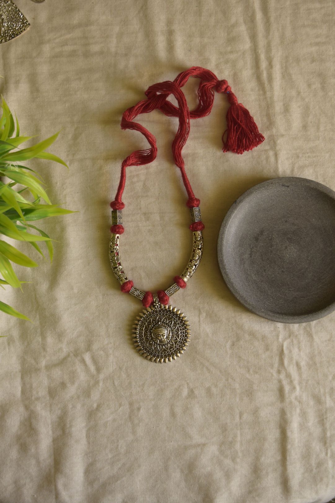 Maroon thread with hasli model with durga chakri medium pendant