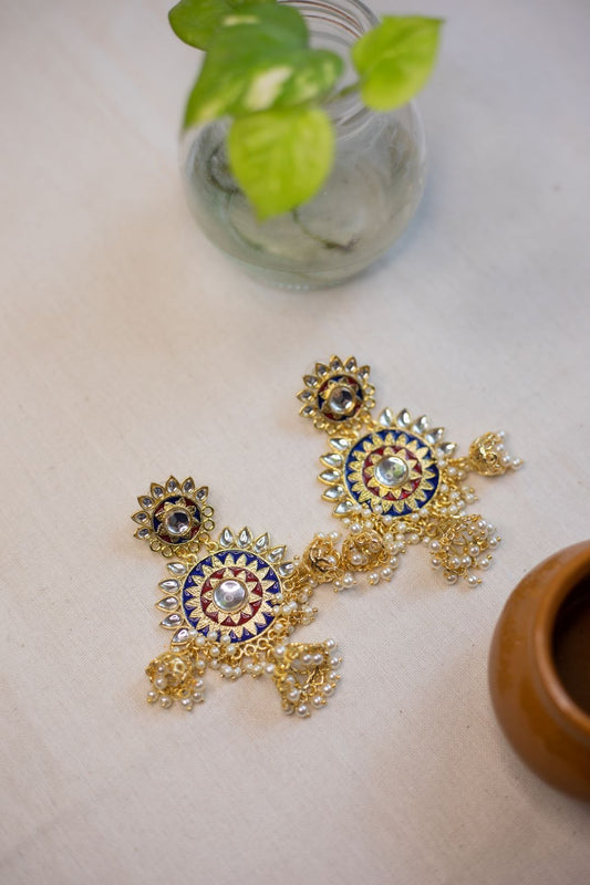 Gold finish Blue & red  chakra and kundan with Chandlier jhumkas .