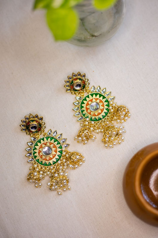 Gold finish Green & orange  chakra white kudan with chandlier jhumkas .